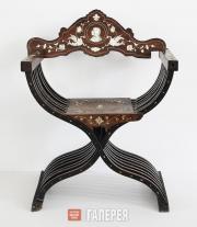 Curule seat in the style of the Italian Renaissance, decorated with a portrait of Girolamo Savonarola Curule seat in the style of the Italian Renaissance, decorated with a portrait o