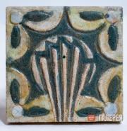 A tile with a stylised floral pattern. Early 1890s A tile with a stylised floral pattern. Early 1890s