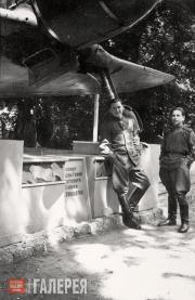 Konstantin Molchanov (right) at the aircraft of the Twice-Hero of the Soviet Union Major Kozhedub. Konstantin Molchanov (right) at the aircraft of the Twice-Hero of the SU