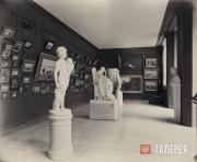 Экспозиция Третьяковской галереи. Зал № 19, на торцевой стене картины В.Д. Поленова «Больная» и «Право господина». 1900 Экспозиция Третьяковской галереи. Зал № 19