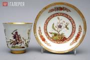 Pieces from a service with embossed flower pattern and image of a horseback ride