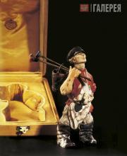 Boris Fredman Cluzel. A carved hardstone model of a street painter by Faberge. 1